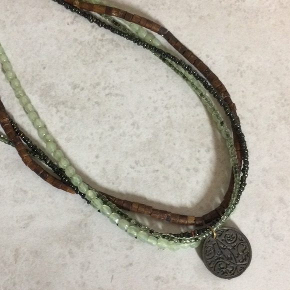 Aura four strand bead necklace with sun moon stars coin pendant - Picture 3 of 8